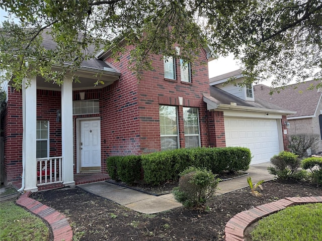 13111 Porter Meadow Ln, Houston, TX 77014 - traditional-style house featuring an attached garage, brick siding, concrete driveway, and roof with shingles