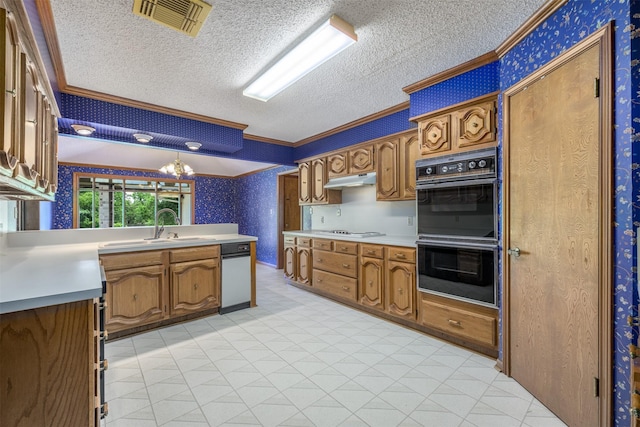 207 Oak Hill Dr, Brenham, TX 77833 - kitchen with wallpapered walls, crown molding, light flooring, a sink, and a textured ceiling