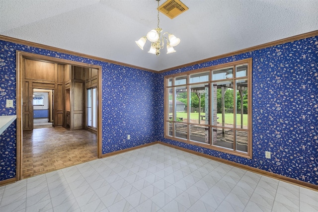 207 Oak Hill Dr, Brenham, TX 77833 - empty room featuring healthy amount of natural light, a chandelier, a textured ceiling, baseboards, and ornamental molding
