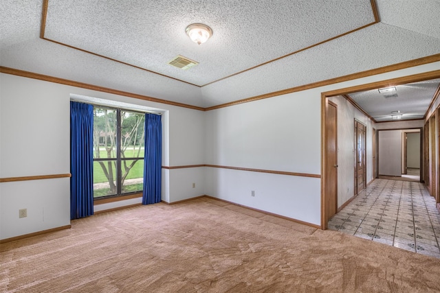 207 Oak Hill Dr, Brenham, TX 77833 - spare room with a textured ceiling, carpet, crown molding, and baseboards