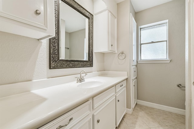 28902 Twisted Oak Dr, Shenandoah, TX 77381 - bathroom featuring vanity, baseboards, and tile patterned floors