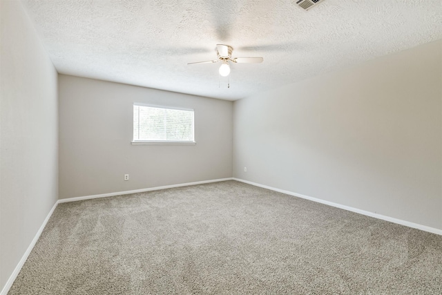 28902 Twisted Oak Dr, Shenandoah, TX 77381 - spare room with a ceiling fan, carpet, a textured ceiling, and baseboards