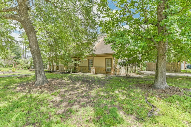 28902 Twisted Oak Dr, Shenandoah, TX 77381 - view of yard featuring fence