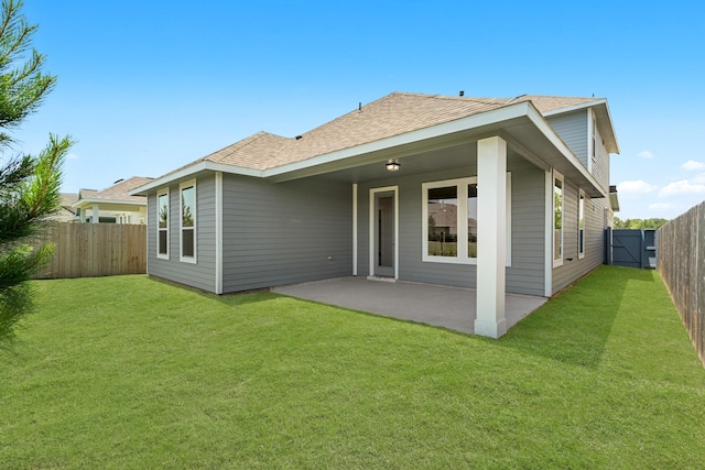 33019 School Hill Rd, Fulshear, TX 77441 - rear view of house featuring a patio and roof with shingles