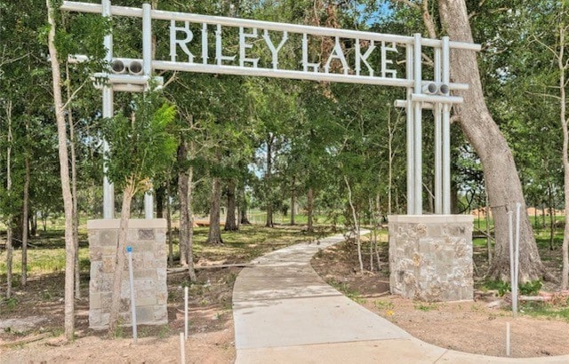33019 School Hill Rd, Fulshear, TX 77441 - view of home's community featuring a gate, view of wooded area, and fence