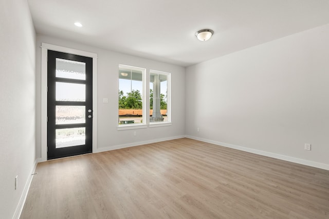 33019 School Hill Rd, Fulshear, TX 77441 - foyer with light wood-type flooring and baseboards