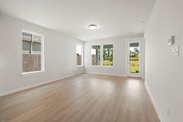 33019 School Hill Rd, Fulshear, TX 77441 - unfurnished room featuring light wood-type flooring and baseboards