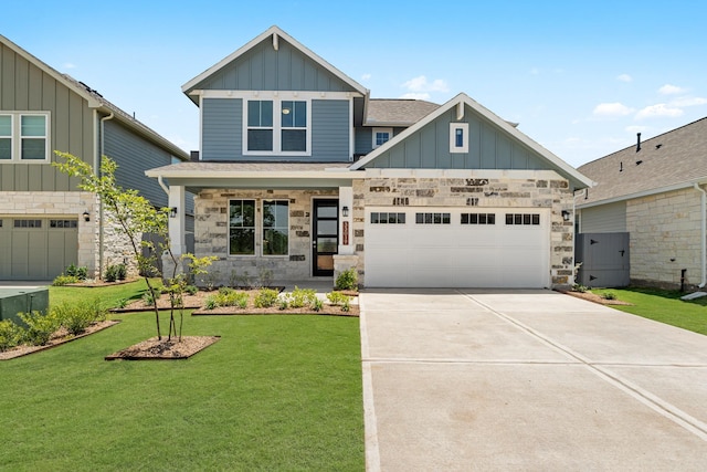 33019 School Hill Rd, Fulshear, TX 77441 - craftsman inspired home with board and batten siding, a front lawn, concrete driveway, a garage, and covered porch