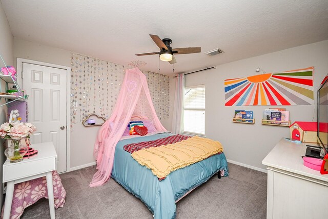 13907 Pawnee Trails Dr, Cypress, TX 77429 - carpeted bedroom with baseboards and a ceiling fan