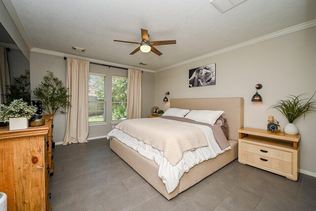 13907 Pawnee Trails Dr, Cypress, TX 77429 - tiled bedroom with baseboards, crown molding, and a ceiling fan