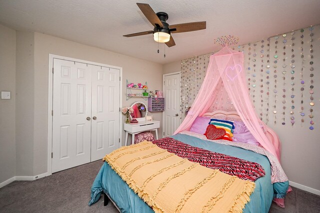 13907 Pawnee Trails Dr, Cypress, TX 77429 - bedroom with carpet flooring, baseboards, a closet, and a ceiling fan