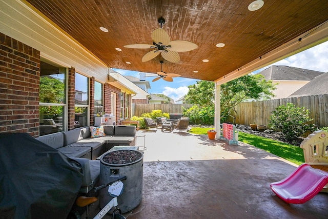 13907 Pawnee Trails Dr, Cypress, TX 77429 - fenced backyard with outdoor lounge area, a patio, outdoor dining space, and a ceiling fan