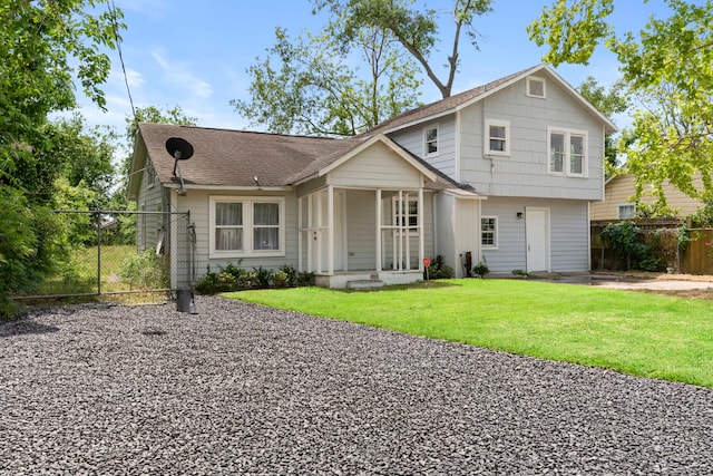 1016 Apache St, Houston, TX 77022 - view of front of home featuring a porch and a shingled roof