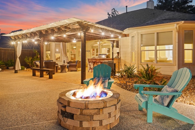 6123 Cypress Way Dr, Magnolia, TX 77354 - view of patio / terrace with an outdoor living space with a fire pit
