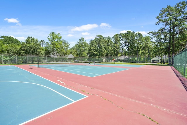 6123 Cypress Way Dr, Magnolia, TX 77354 - view of tennis court featuring fence, community basketball court, and view of wooded area