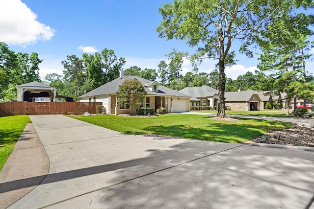 6123 Cypress Way Dr, Magnolia, TX 77354 - view of front of house featuring an attached garage, driveway, and brick siding