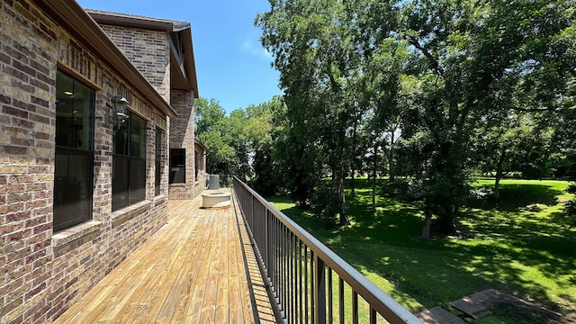 4818 Lake Village Dr, Fulshear, TX 77441 - wooden deck featuring a yard