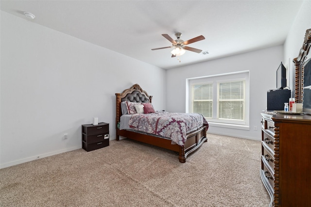 6815 Bardsdale Ct, Rosharon, TX 77583 - bedroom featuring light colored carpet, ceiling fan, and baseboards