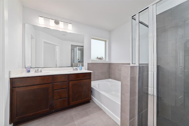 6815 Bardsdale Ct, Rosharon, TX 77583 - bathroom with a stall shower, a bath, double vanity, and tile patterned floors
