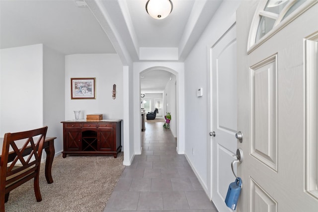 6815 Bardsdale Ct, Rosharon, TX 77583 - hall with arched walkways, light tile patterned floors, and baseboards