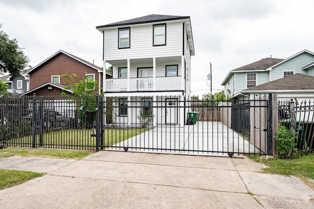 9026 Mcgallion Rd, Houston, TX 77022 - view of front of property with a porch, a gate, and driveway