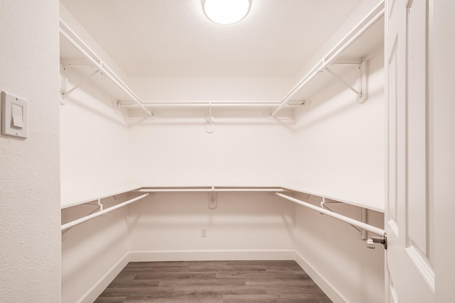 9026 Mcgallion Rd, Houston, TX 77022 - spacious closet featuring wood finished floors