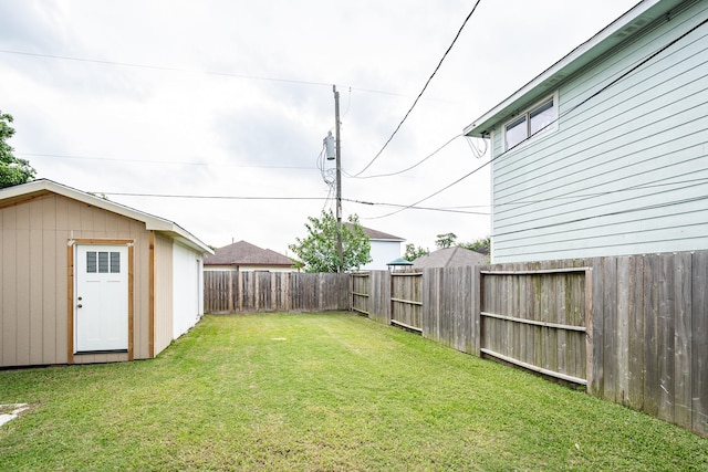 9026 Mcgallion Rd, Houston, TX 77022 - view of yard with an outbuilding and a storage shed