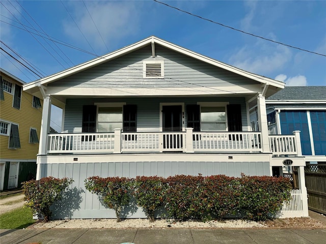 711 17th St, Galveston, TX 77550 - view of front of home with a porch