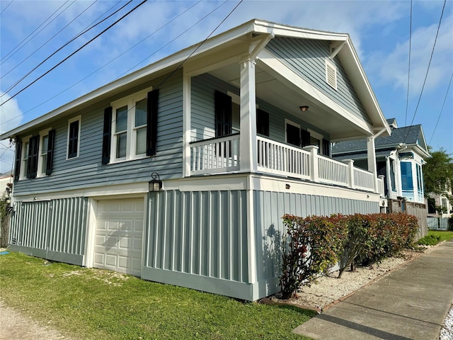 711 17th St, Galveston, TX 77550 - view of home's exterior featuring a balcony and a yard