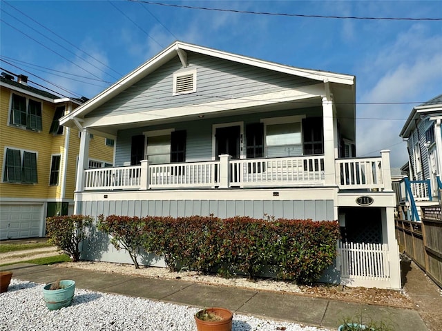 711 17th St, Galveston, TX 77550 - view of front of property with a porch