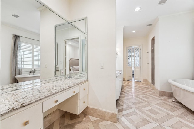 1 Exbury Way, Houston, TX 77056 - bathroom with healthy amount of natural light, crown molding, baseboards, vanity, and recessed lighting