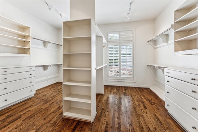 1 Exbury Way, Houston, TX 77056 - walk in closet with dark wood finished floors