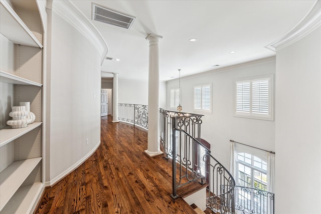 1 Exbury Way, Houston, TX 77056 - hall featuring decorative columns, crown molding, an upstairs landing, healthy amount of natural light, and wood finished floors