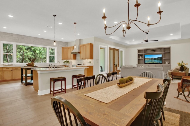 6114 E Bluff Ct, Magnolia, TX 77354 - dining space featuring light wood-type flooring, recessed lighting, and a chandelier