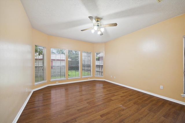 19119 Timber Trace Dr, Humble, TX 77346 - unfurnished room with ceiling fan, wood finished floors, baseboards, and a textured ceiling