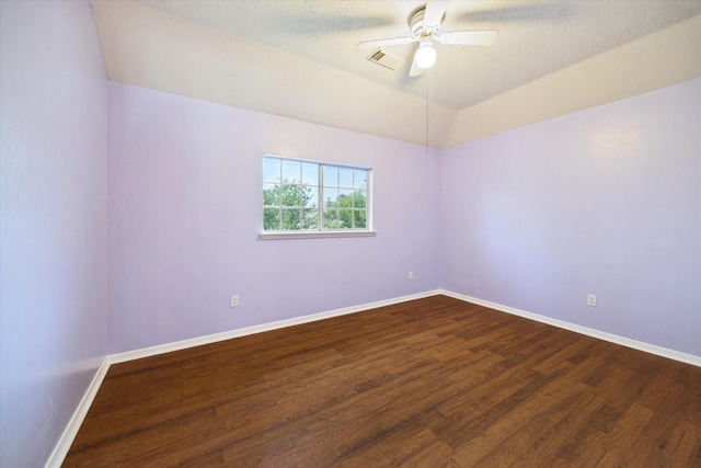 19119 Timber Trace Dr, Humble, TX 77346 - unfurnished room featuring dark wood-type flooring, a ceiling fan, baseboards, and lofted ceiling