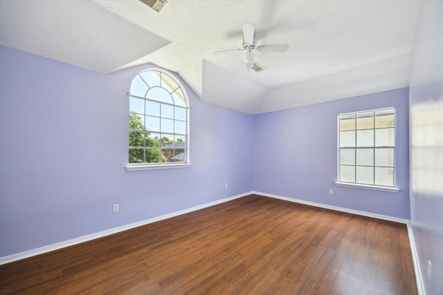 19119 Timber Trace Dr, Humble, TX 77346 - spare room with a ceiling fan, wood finished floors, lofted ceiling, and baseboards
