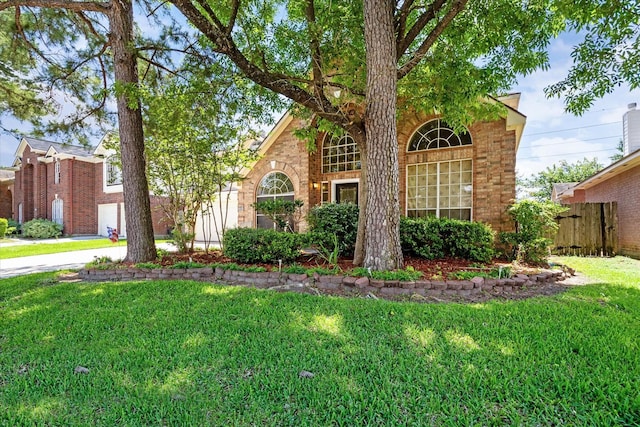 19119 Timber Trace Dr, Humble, TX 77346 - traditional-style house with brick siding and driveway