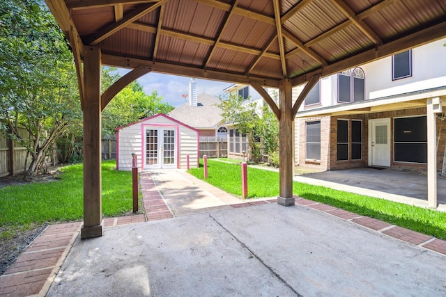 19119 Timber Trace Dr, Humble, TX 77346 - view of patio with french doors, an outbuilding, and a gazebo