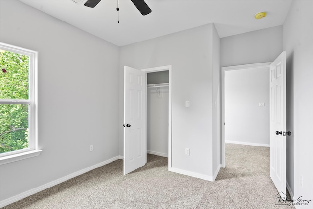 7983 Ethel St, Houston, TX 77028 - unfurnished bedroom featuring multiple windows, light colored carpet, and baseboards