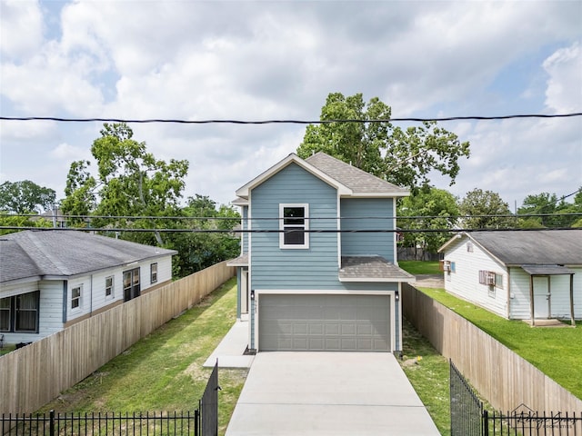 7983 Ethel St, Houston, TX 77028 - view of front of property featuring a shingled roof, an attached garage, and driveway