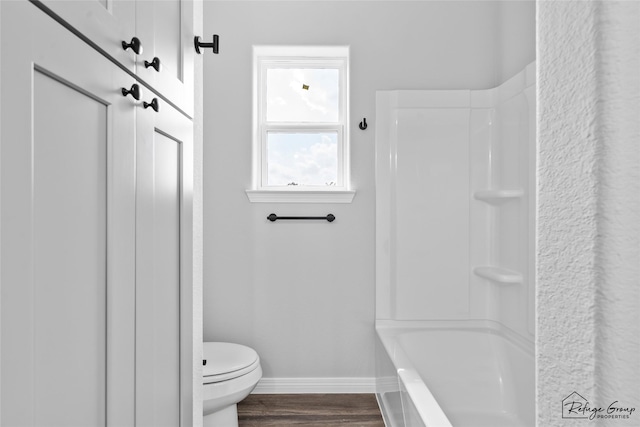 7983 Ethel St, Houston, TX 77028 - bathroom with baseboards, toilet, and wood finished floors
