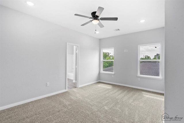 7983 Ethel St, Houston, TX 77028 - carpeted spare room with baseboards, ceiling fan, and recessed lighting