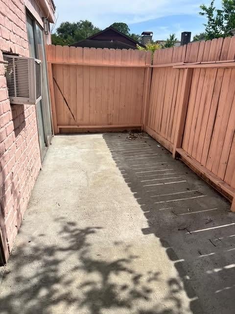 7847 Creekbend Dr, Houston, TX 77071 - view of patio / terrace featuring cooling unit