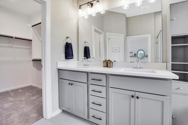 477 Long Leaf Pine Dr, Montgomery, TX 77316 - full bathroom with a spacious closet, double vanity, baseboards, and a shower