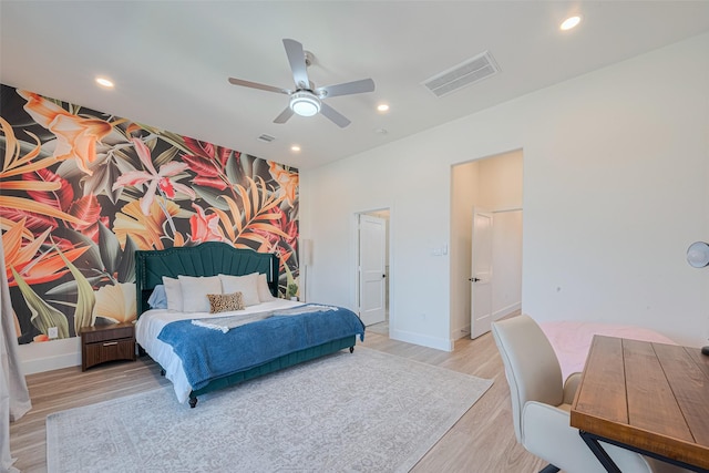 2909 Nagle St, Houston, TX 77004 - bedroom featuring light wood-type flooring, recessed lighting, a ceiling fan, and baseboards