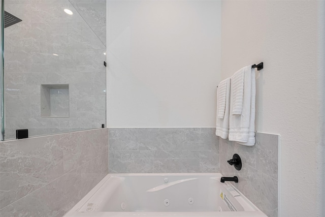 2909 Nagle St, Houston, TX 77004 - bathroom with a whirlpool tub and tiled shower