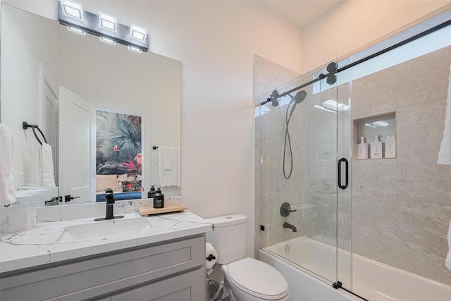 2909 Nagle St, Houston, TX 77004 - full bathroom with combined bath / shower with glass door, vanity, and toilet