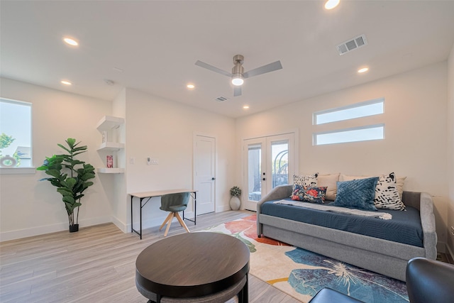 2909 Nagle St, Houston, TX 77004 - living area with light wood-style flooring, recessed lighting, a ceiling fan, and baseboards