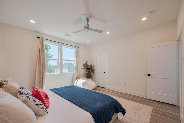 2909 Nagle St, Houston, TX 77004 - bedroom featuring light wood-style flooring, recessed lighting, baseboards, and a ceiling fan